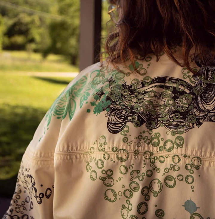 A custom printed white jacket with colorful bubble print.